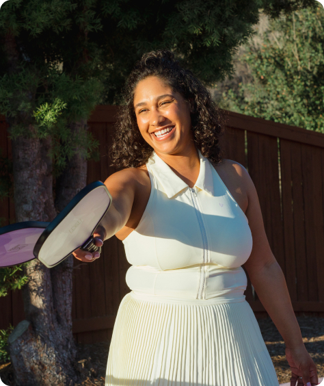 Woman playing pickleball example of how long does it take to form a habit.