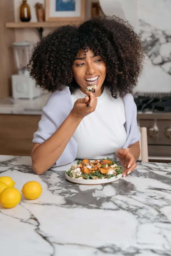 longevity_supplements_woman_eating_600x900