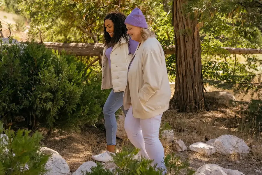 Two_Women_Walking_On_A_Hike_900x600