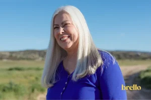 Mature woman outdoors showing natural signs of collagen loss in face