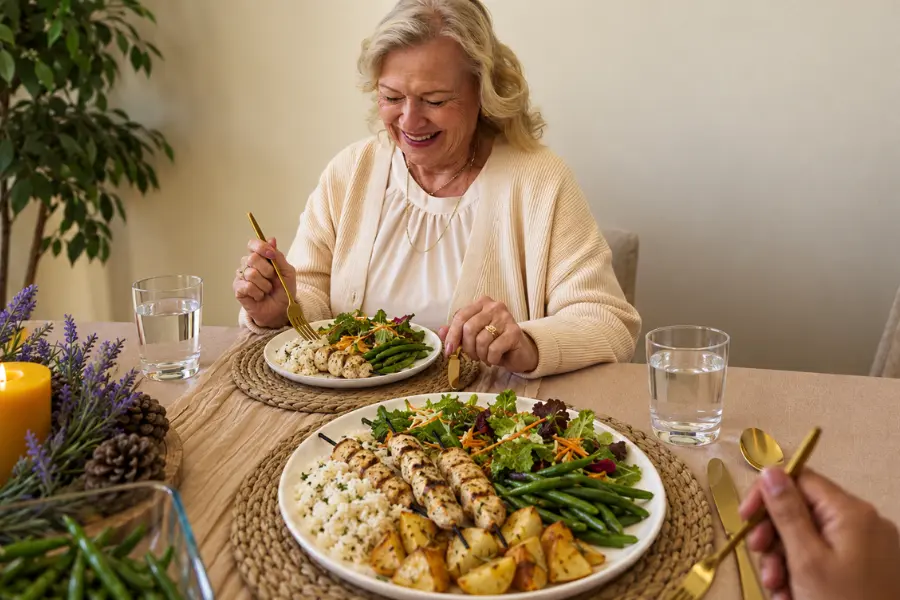 Two dinner plates at one table, one built smaller and protein-first, example of high protein dinners.