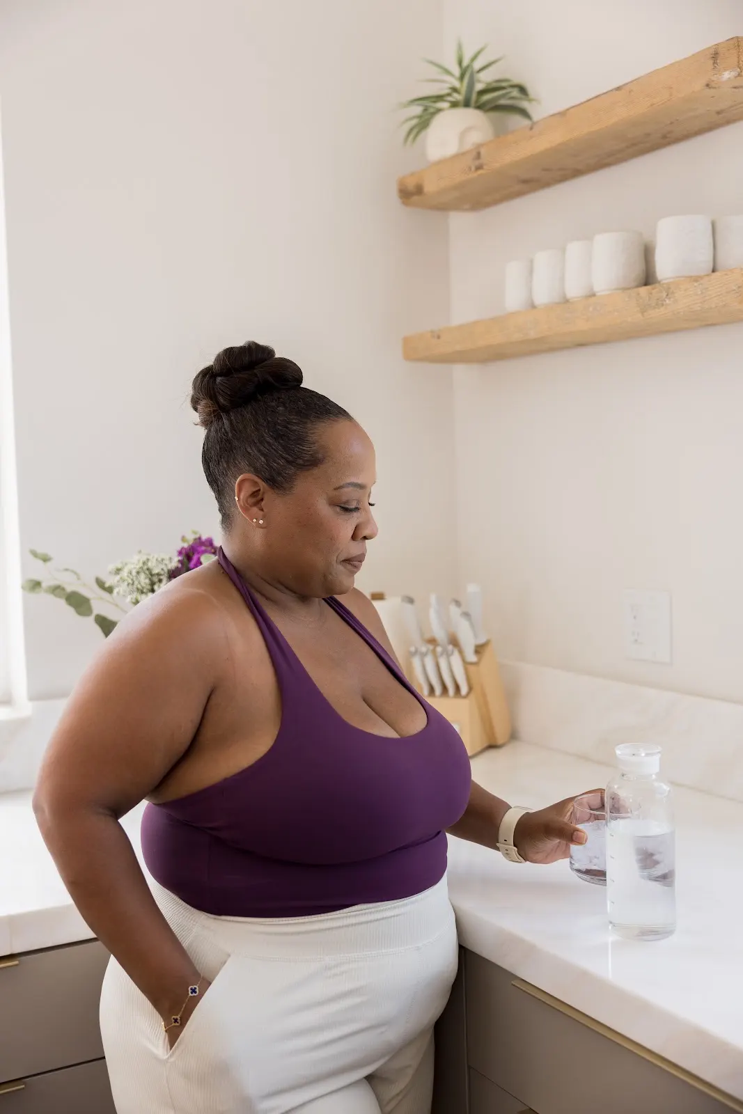 Woman starting her morning wellness routine with the best electrolytes for hydration